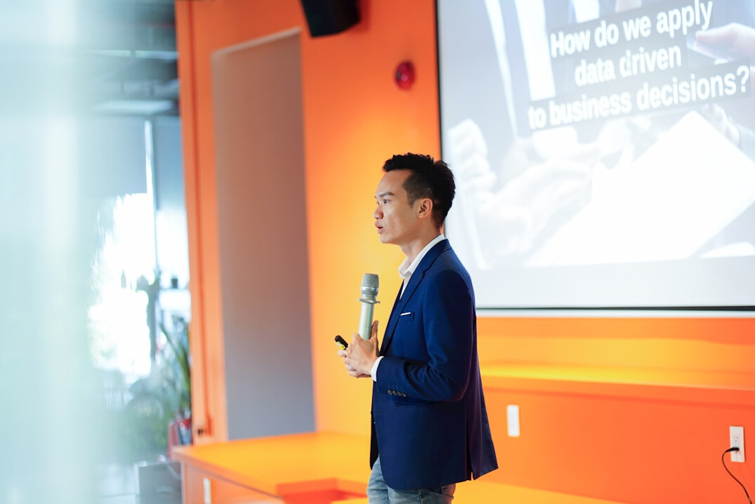 confident speaker on stage