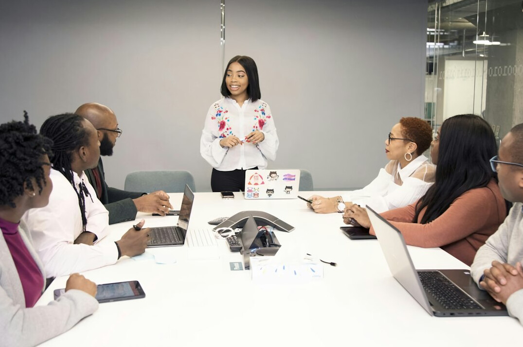 professional woman presenting in meeting
